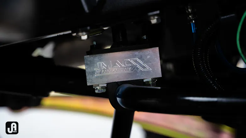 Close up of JMACX Off Road Solutions Logo of build component used as part of 79 Series build