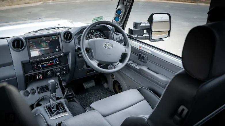 Interior of 79 Series, showing driver's seat and steering wheel