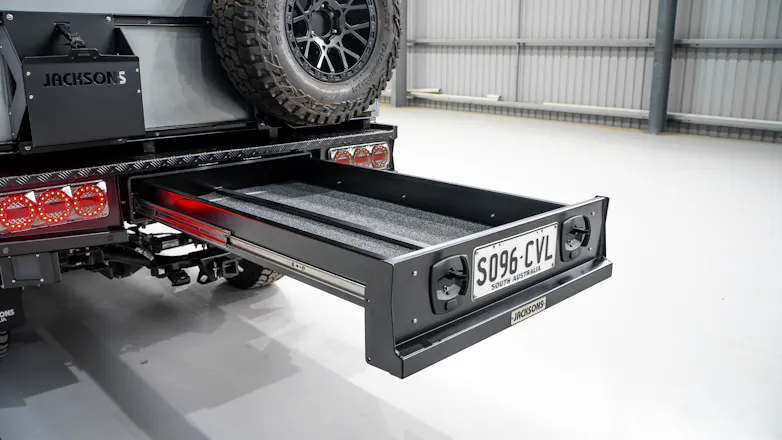Silver Ford Ranger with Jacksons Australia tray pulled out