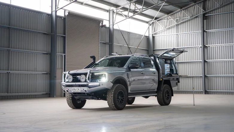 Silver Next-Gen 2023 Ford Ranger fully modified, including ARB bullbar, Safari snorkel and a Jacksons Australia silver canopy & tray