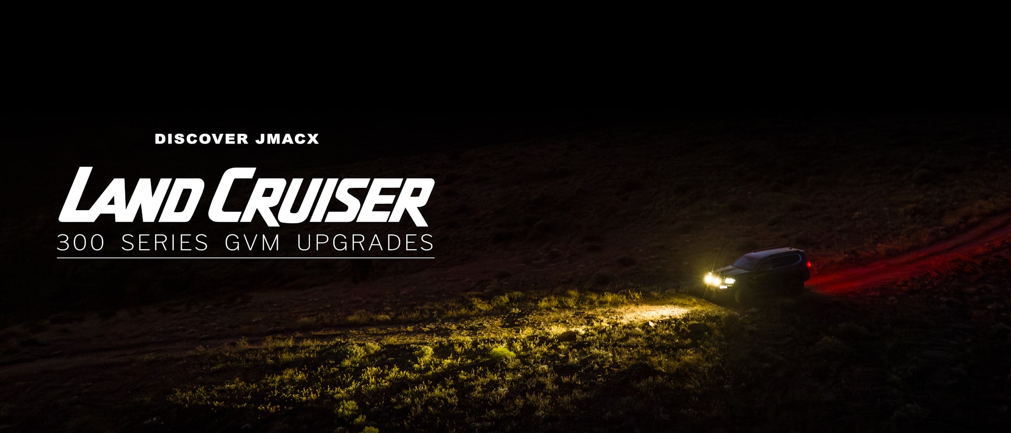 Landcruiser driving offroad at nighttime, with caption "Discover Jmacx Landcruiser 300 Series GVM Upgrades"