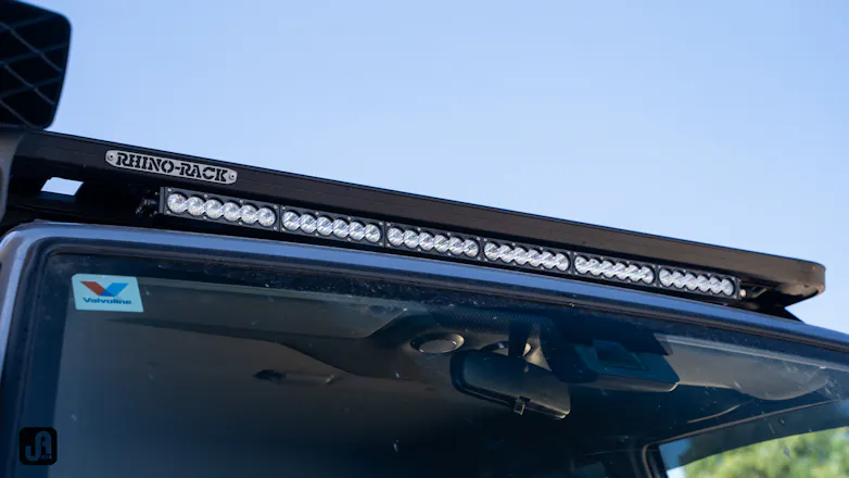 Ultra Vision Raptor 20” light bar fitted below a Rhino Rack Pioneer platform