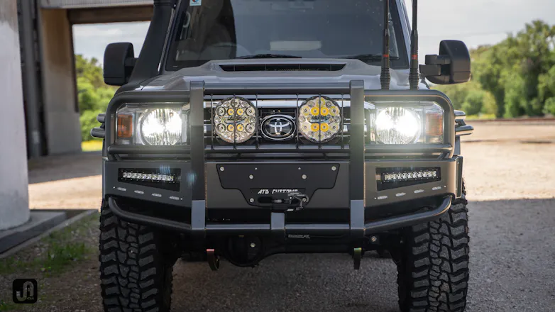 Front view of Graphite wrapped 79 Series with Safari ARMAX snorkel and ATD Apocalypse bullbar