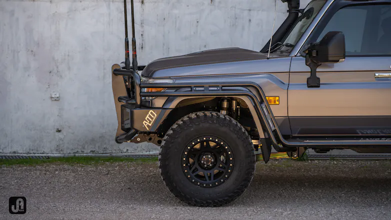 Front side image of graphite 79 Series with Method 312 HD wheels and ATD Customs Apocalypse bar