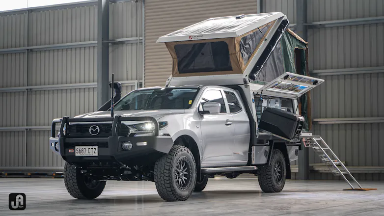 Silver Mazda BT-50 with fitted camper