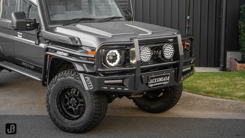 Grey 79 Series Landcruiser with mods including ATD custom bullbar and ROH Hammer wheels
