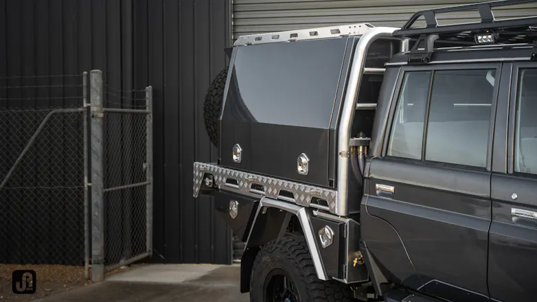 Charcoal grey 79 Series Landcruiser with Norweld canopy and tray