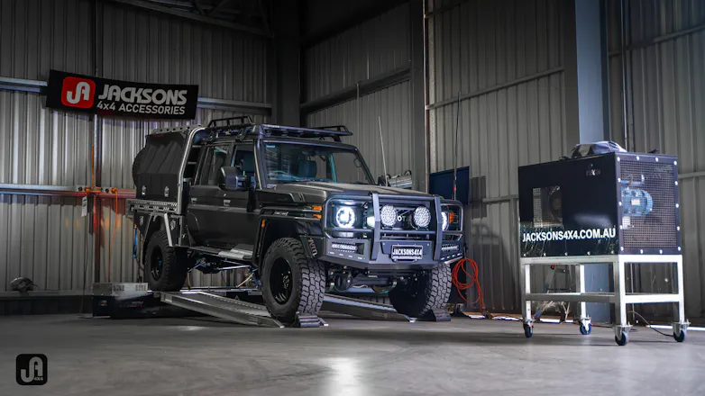Toyota 79 Series Landcruiser on the ramps at Jacksons 4x4 garage for custom fitout
