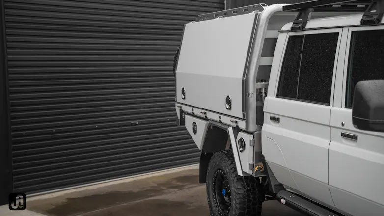 White 79 Series Landcruiser with Norweld canopy and tray